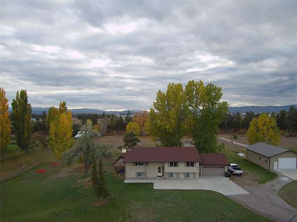 5.2 Acres of Residential Land with Home for Sale in Kalispell, Montana