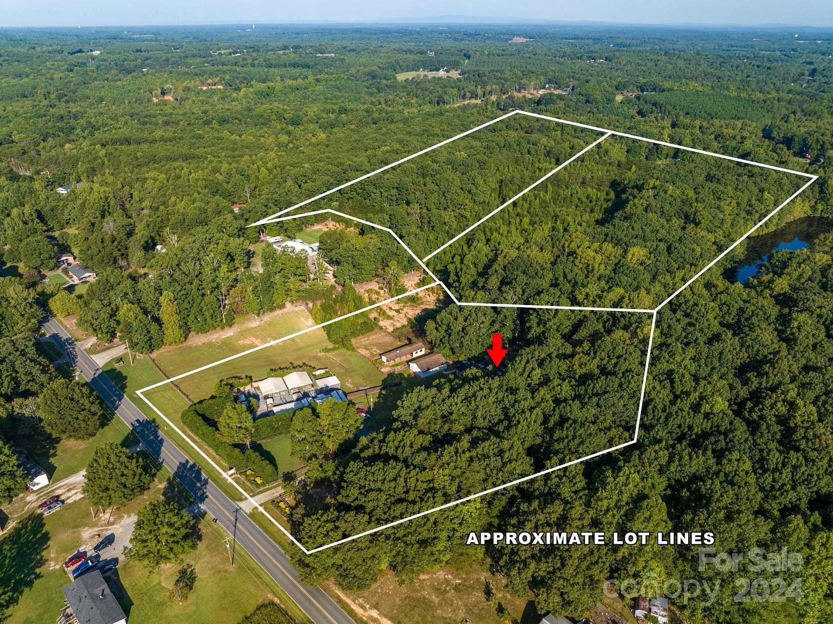 6.7 Acres of Land with Home for Sale in Dallas, North Carolina