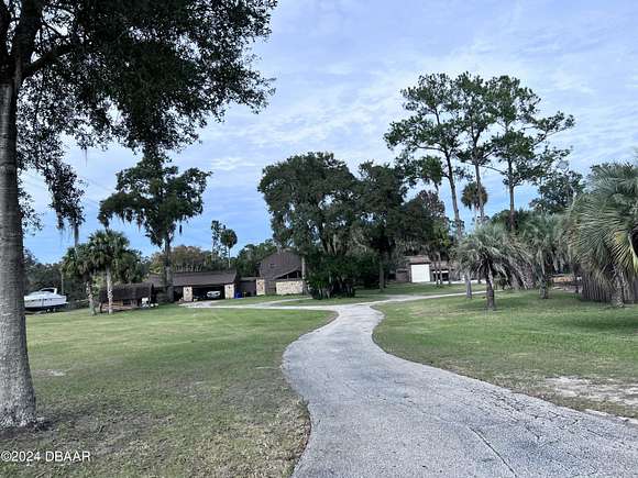 2.3 Acres of Residential Land with Home for Sale in Longwood, Florida