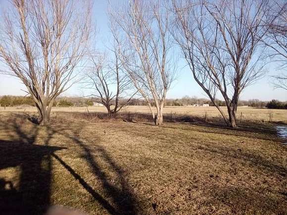 30 Acres of Land with Home for Sale in Deport, Texas