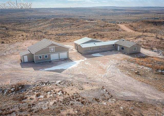 10.9 Acres of Land with Home for Sale in Fountain, Colorado