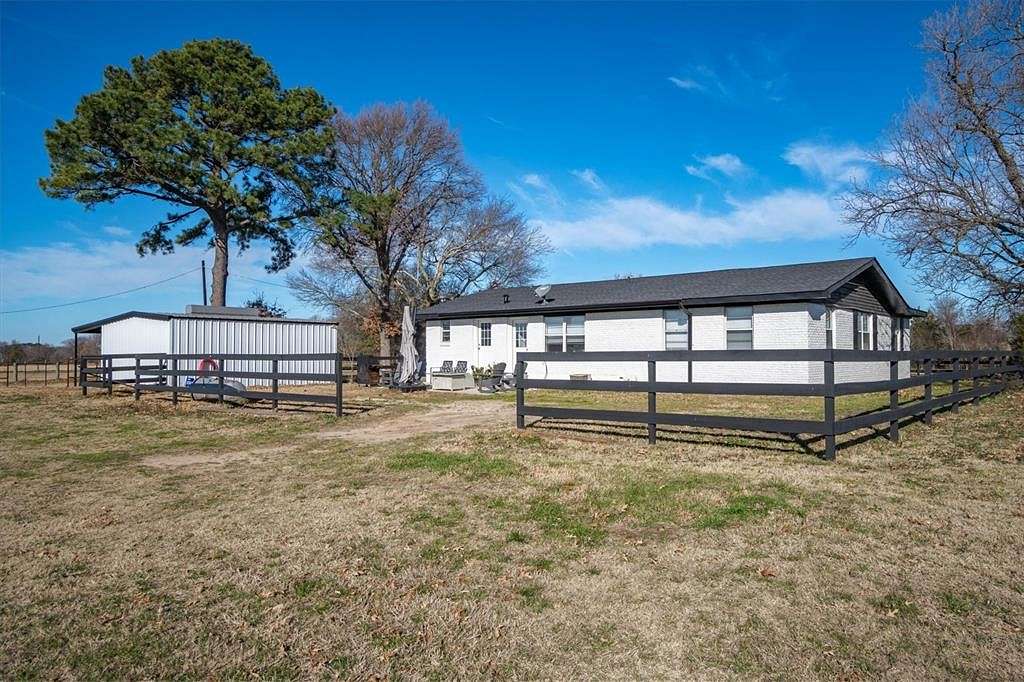 97.27 Acres of Agricultural Land with Home for Sale in Athens, Texas