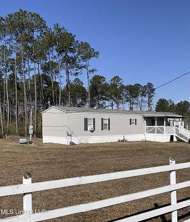 2.4 Acres of Residential Land with Home for Sale in Kiln, Mississippi