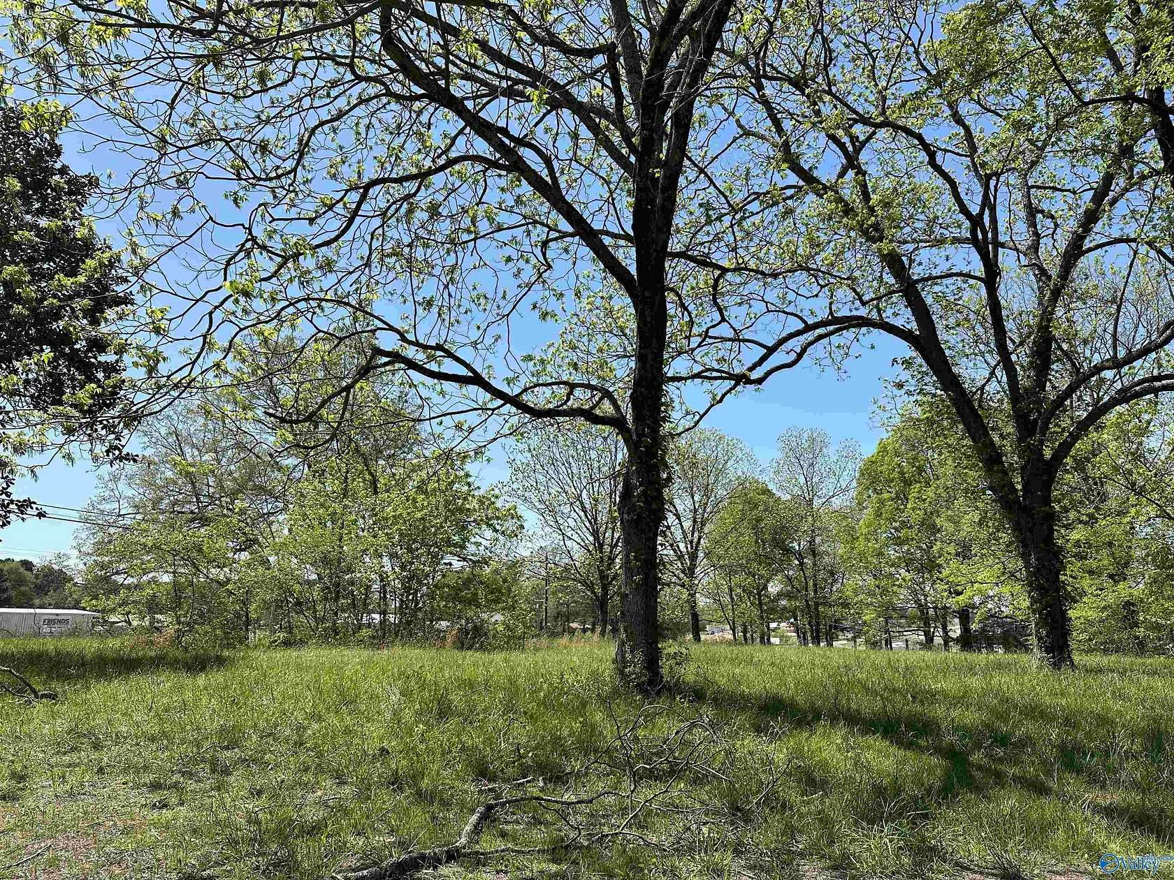 1.6 Acres of Commercial Land for Sale in Laceys Spring, Alabama