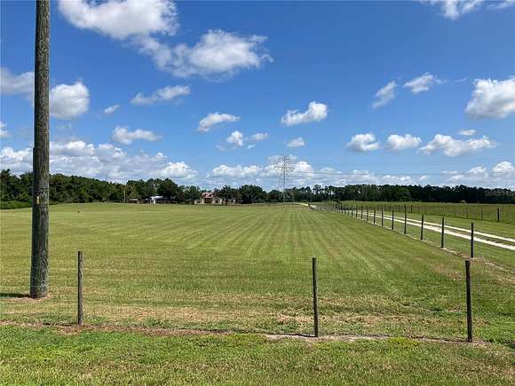 9.9 Acres of Residential Land with Home for Sale in Howey-in-the-Hills, Florida
