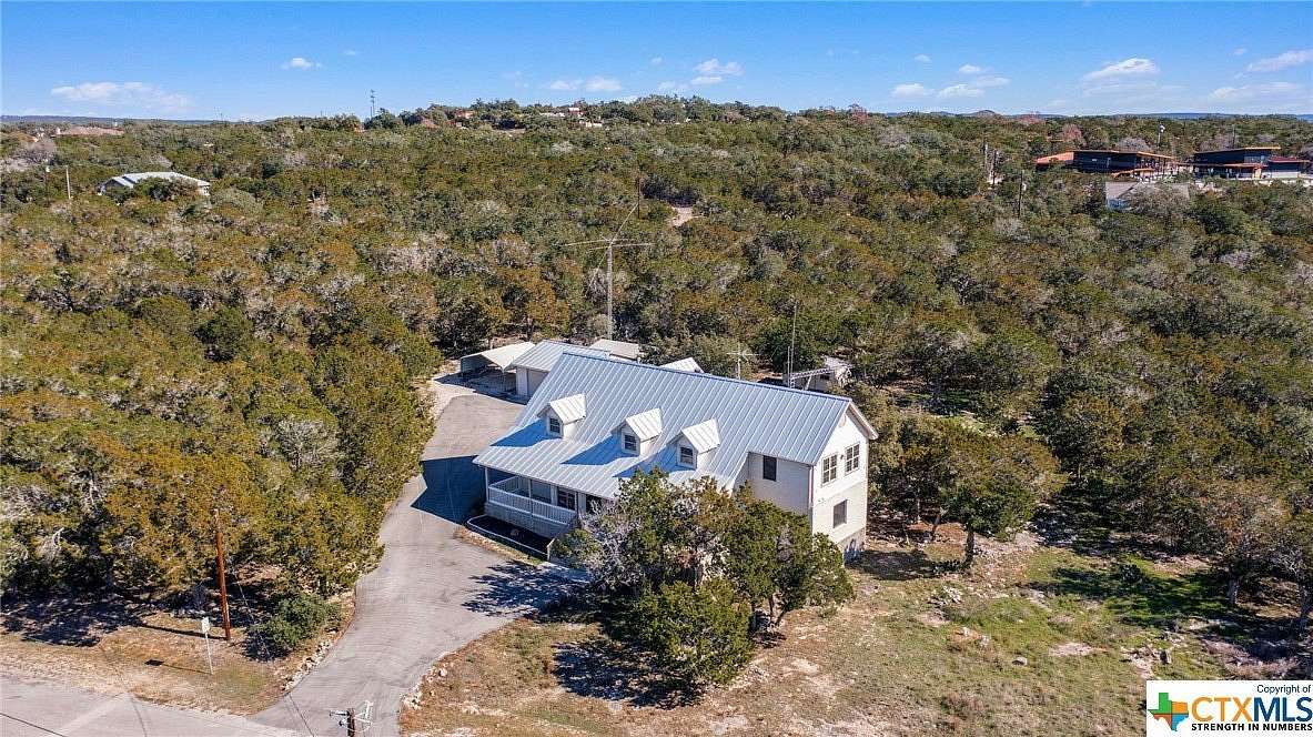 3.58 Acres of Land with Home for Sale in Canyon Lake, Texas