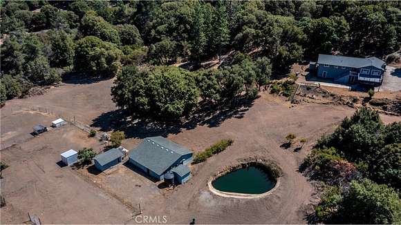 10.69 Acres of Land with Home for Sale in Kelseyville, California