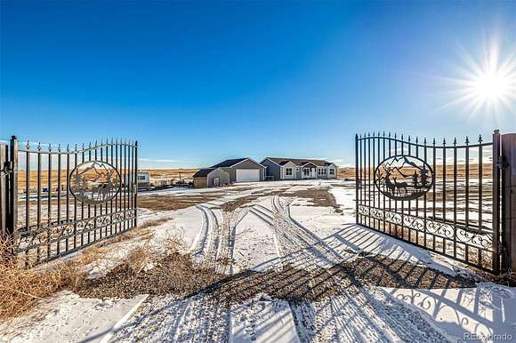 35 Acres of Agricultural Land with Home for Sale in Strasburg, Colorado