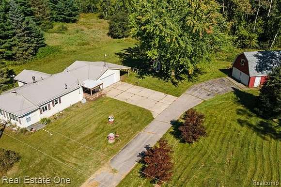 18.5 Acres of Land with Home for Sale in Rhodes, Michigan