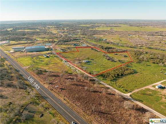 10.2 Acres of Improved Commercial Land for Sale in Luling, Texas
