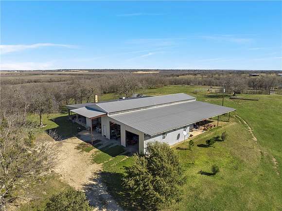 21.1 Acres of Agricultural Land with Home for Sale in Lott, Texas
