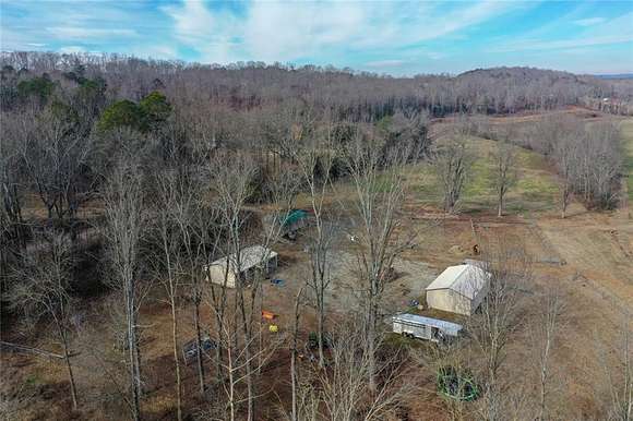 105 Acres of Agricultural Land with Home for Sale in Eastanollee, Georgia