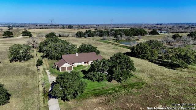 10 Acres of Residential Land with Home for Sale in Floresville, Texas