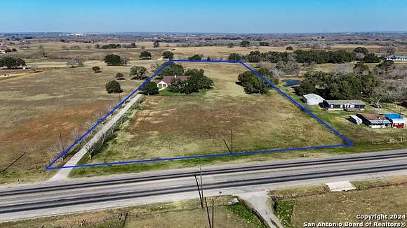 10 Acres of Residential Land with Home for Sale in Floresville, Texas