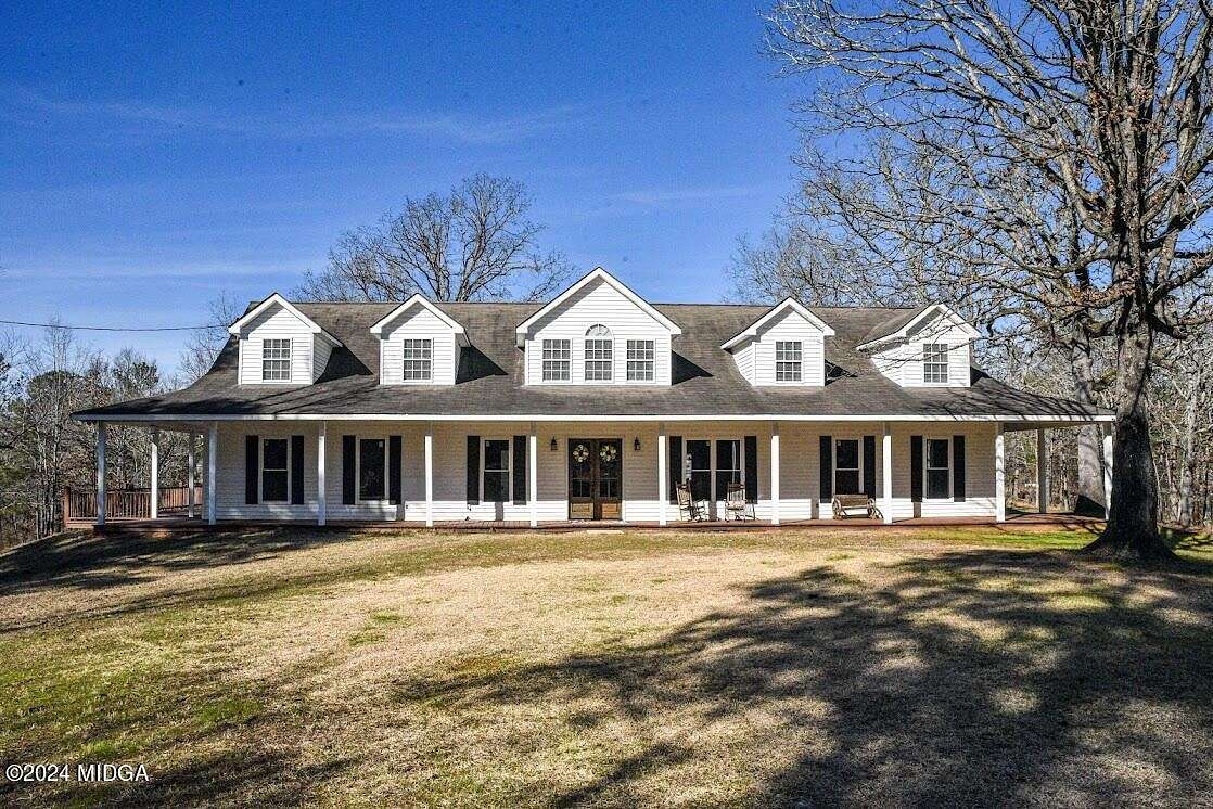 20.9 Acres of Land with Home for Sale in Juliette, Georgia