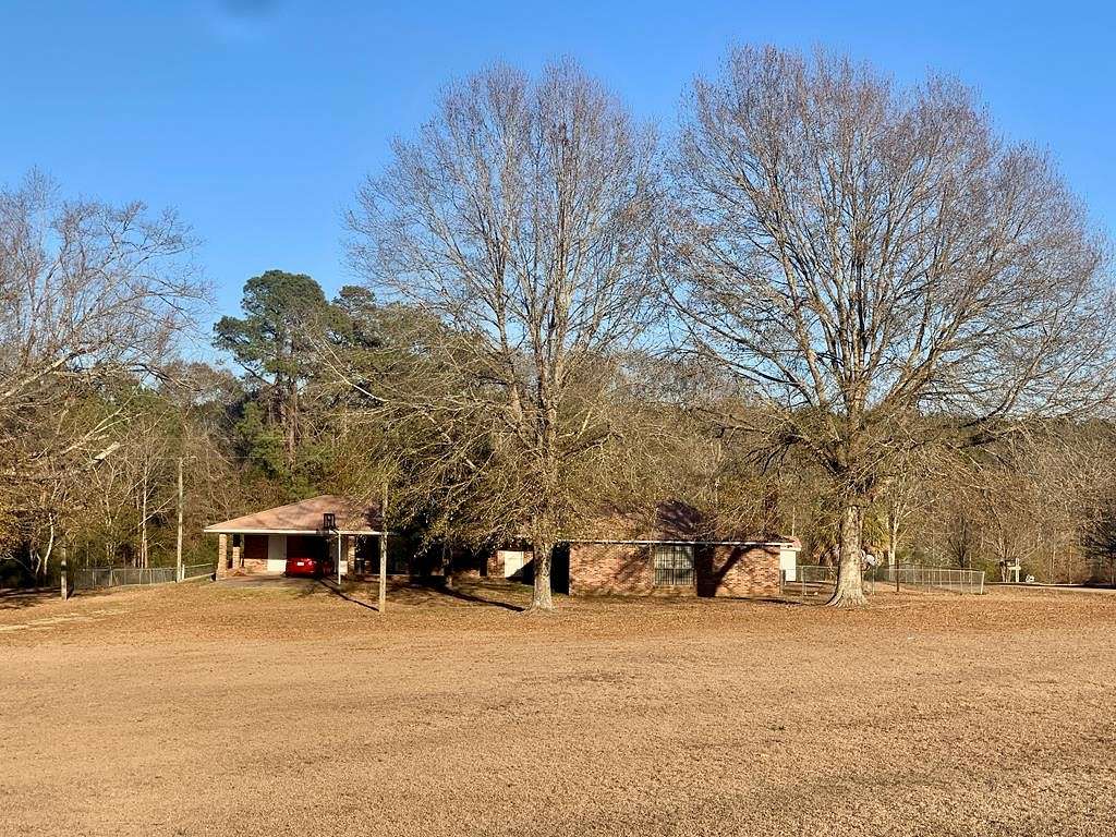 2.2 Acres of Residential Land with Home for Sale in Sumrall, Mississippi