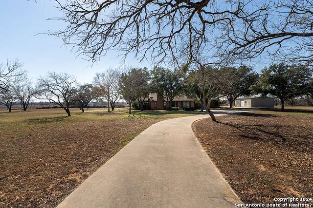 2.3 Acres of Residential Land with Home for Sale in Floresville, Texas