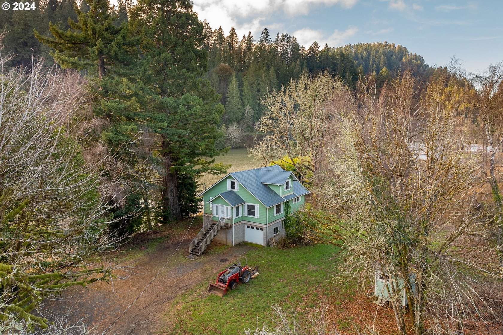 6.6 Acres of Residential Land with Home for Sale in Florence, Oregon