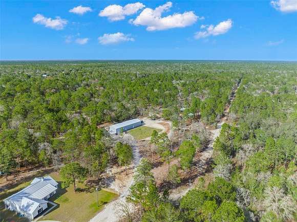 31 Acres of Agricultural Land with Home for Sale in Weeki Wachee, Florida