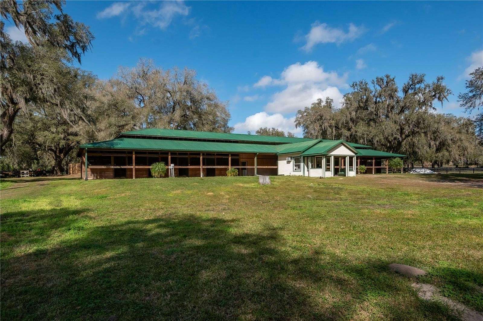 25.6 Acres of Agricultural Land with Home for Sale in Reddick, Florida