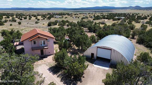 5.3 Acres of Residential Land with Home for Sale in Seligman, Arizona