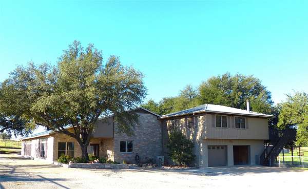 63 Acres of Recreational Land with Home for Sale in Brady, Texas
