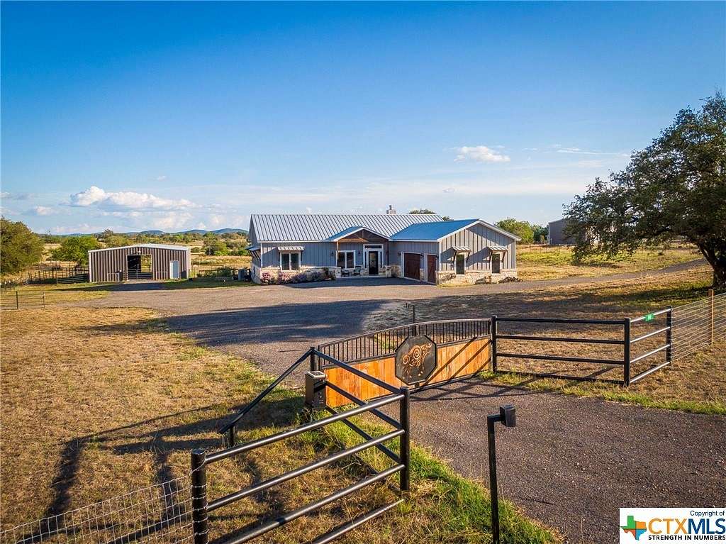 10.872 Acres of Land with Home for Sale in Bandera, Texas