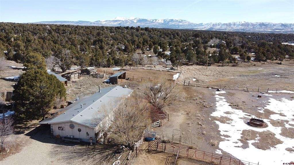 30 Acres of Land with Home for Sale in Mancos, Colorado