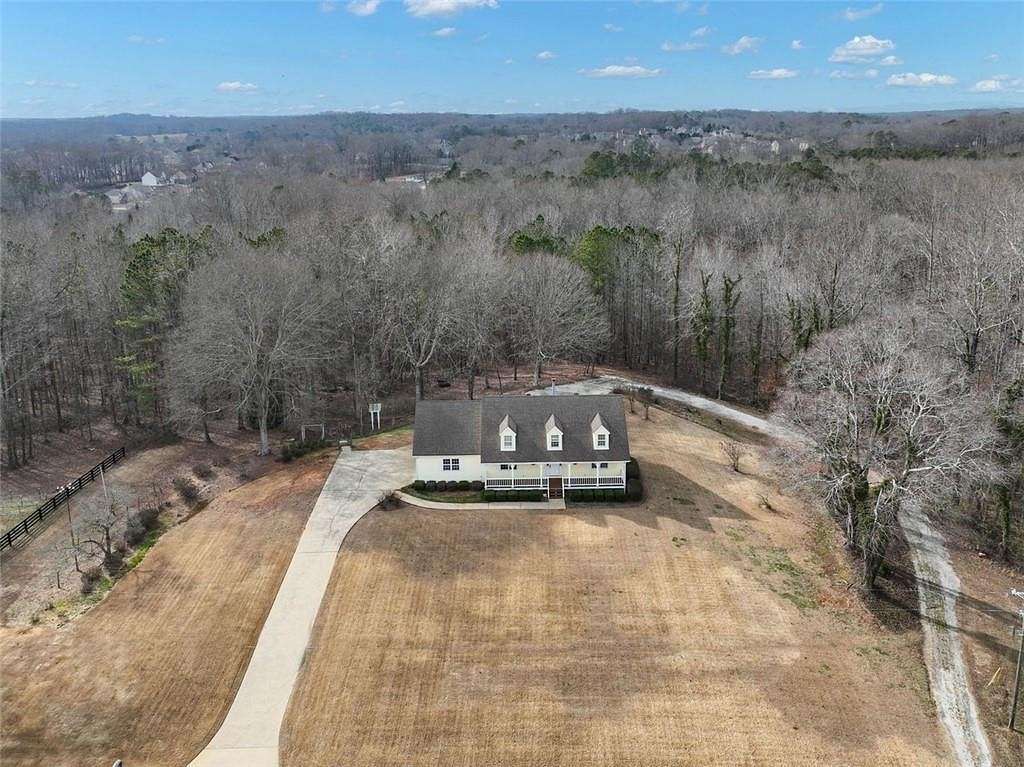 10.9 Acres of Land with Home for Sale in Canton, Georgia