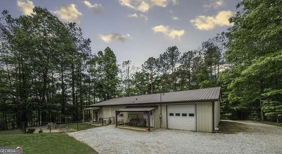 33.1 Acres of Recreational Land with Home for Sale in Carrollton, Georgia