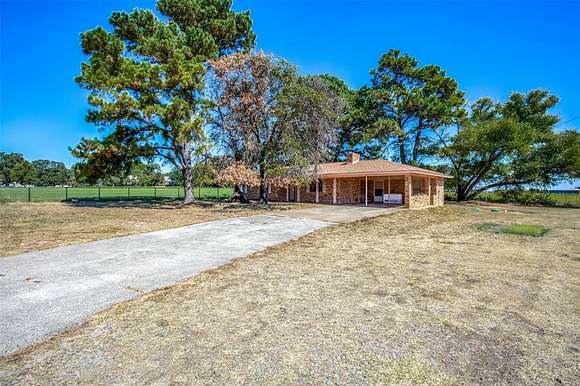 6 Acres of Land with Home for Sale in Pilot Point, Texas