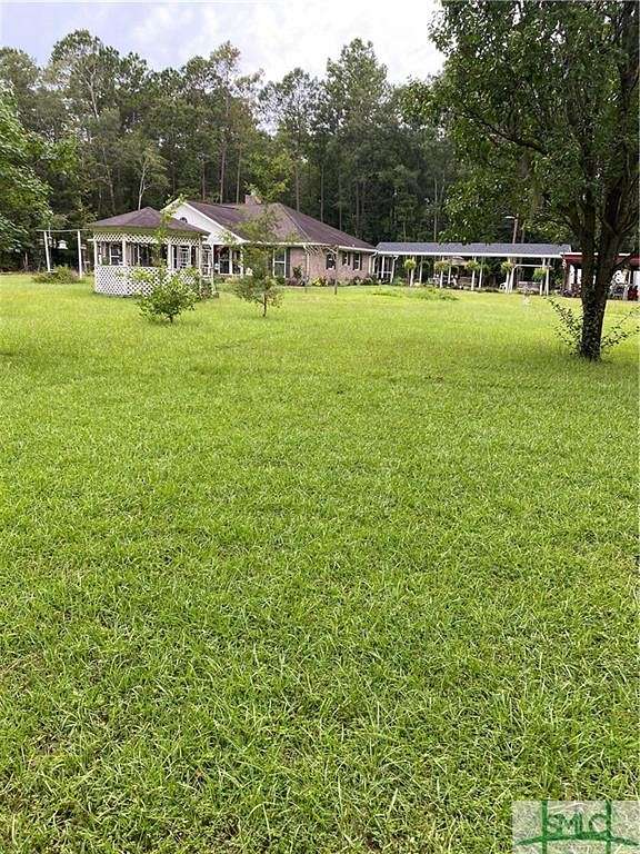 6.6 Acres of Residential Land with Home for Sale in Rincon, Georgia
