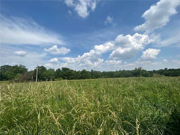 16.9 Acres of Land for Sale in Gravette, Arkansas