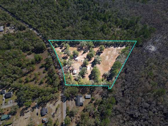 5.8 Acres of Residential Land with Home for Sale in Sopchoppy, Florida