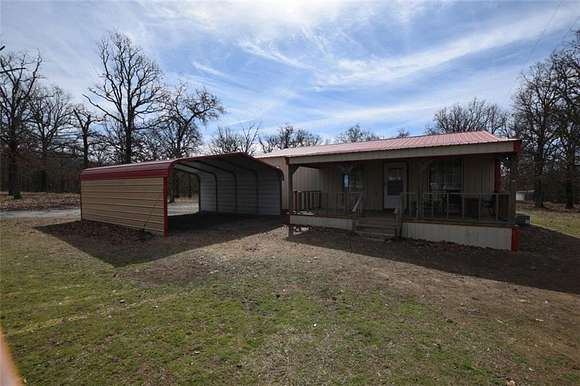 13.6 Acres of Land with Home for Sale in Tahlequah, Oklahoma