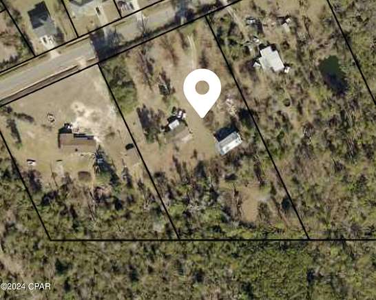 2.7 Acres of Residential Land with Home for Sale in Youngstown, Florida