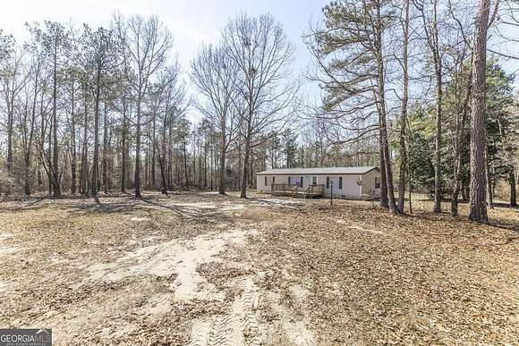7.9 Acres of Residential Land with Home for Sale in Fort Valley, Georgia
