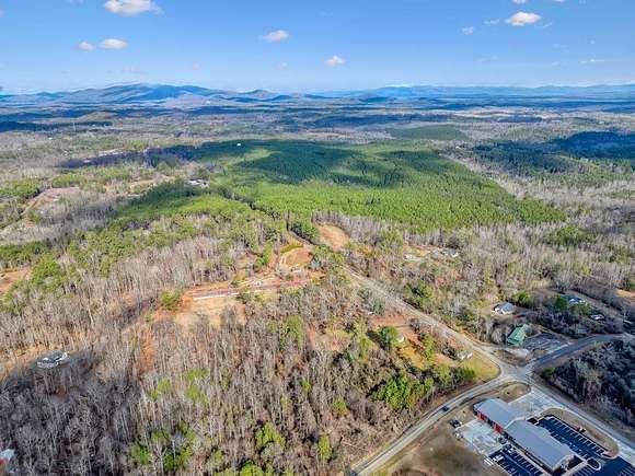 7.7 Acres of Residential Land with Home for Sale in Ball Ground, Georgia