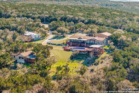 5.3 Acres of Residential Land with Home for Sale in Pipe Creek, Texas
