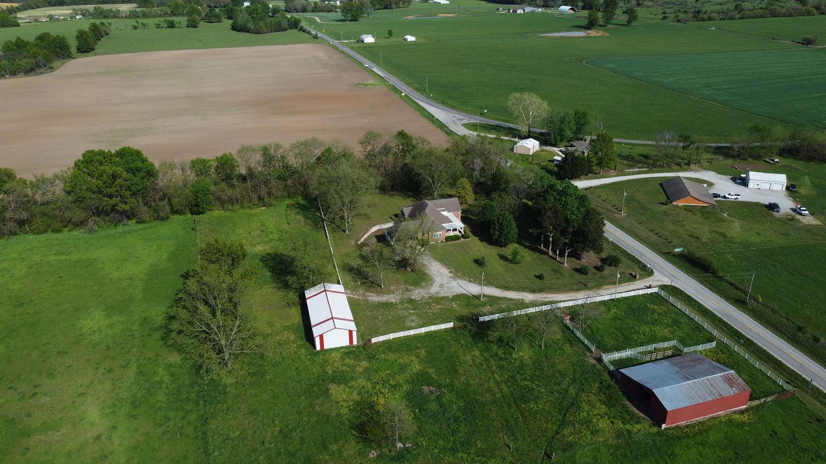 60 Acres of Agricultural Land with Home for Sale in El Dorado Springs, Missouri