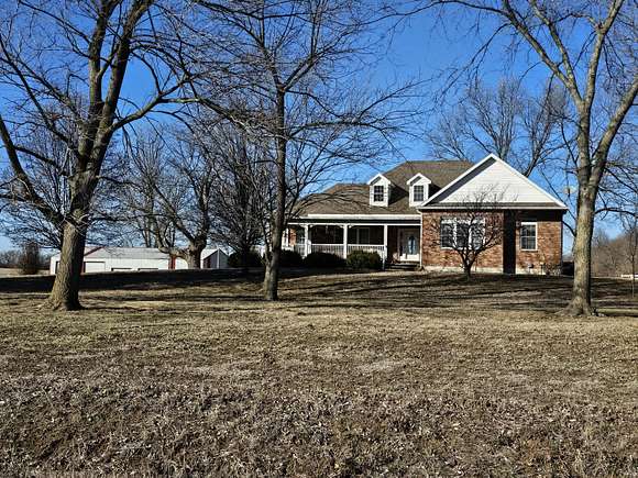 60 Acres of Agricultural Land with Home for Sale in El Dorado Springs, Missouri