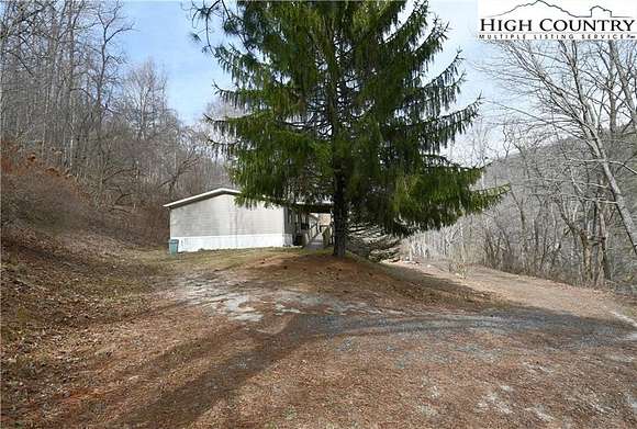 17.3 Acres of Land with Home for Sale in Newland, North Carolina