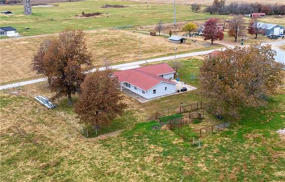 19.8 Acres of Land with Home for Sale in Gentry, Arkansas