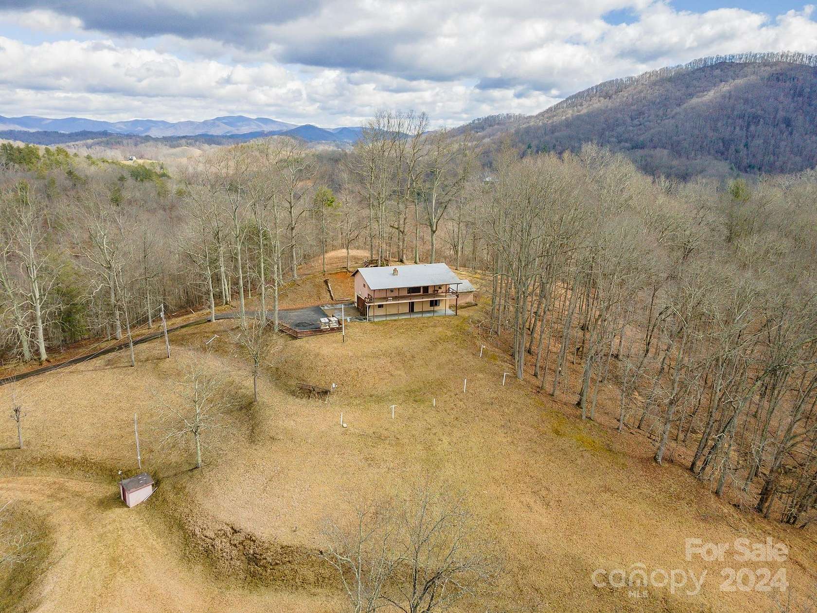 42.7 Acres of Land with Home for Sale in Green Mountain, North Carolina