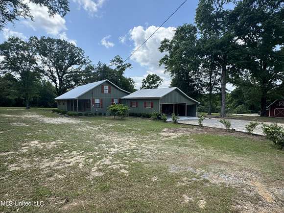 7.9 Acres of Residential Land with Home for Sale in Lucedale, Mississippi