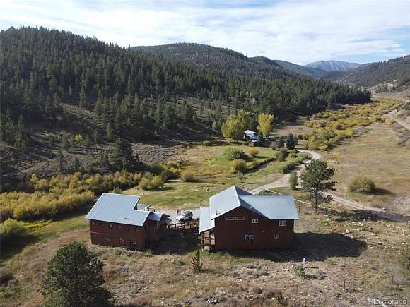 9.2 Acres of Residential Land with Home for Sale in Poncha Springs, Colorado