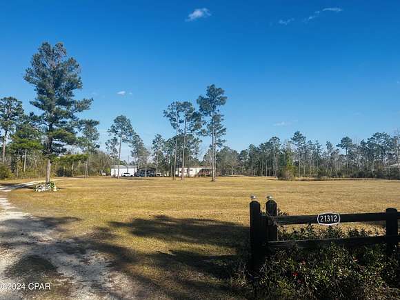 20 Acres of Agricultural Land with Home for Sale in Fountain, Florida