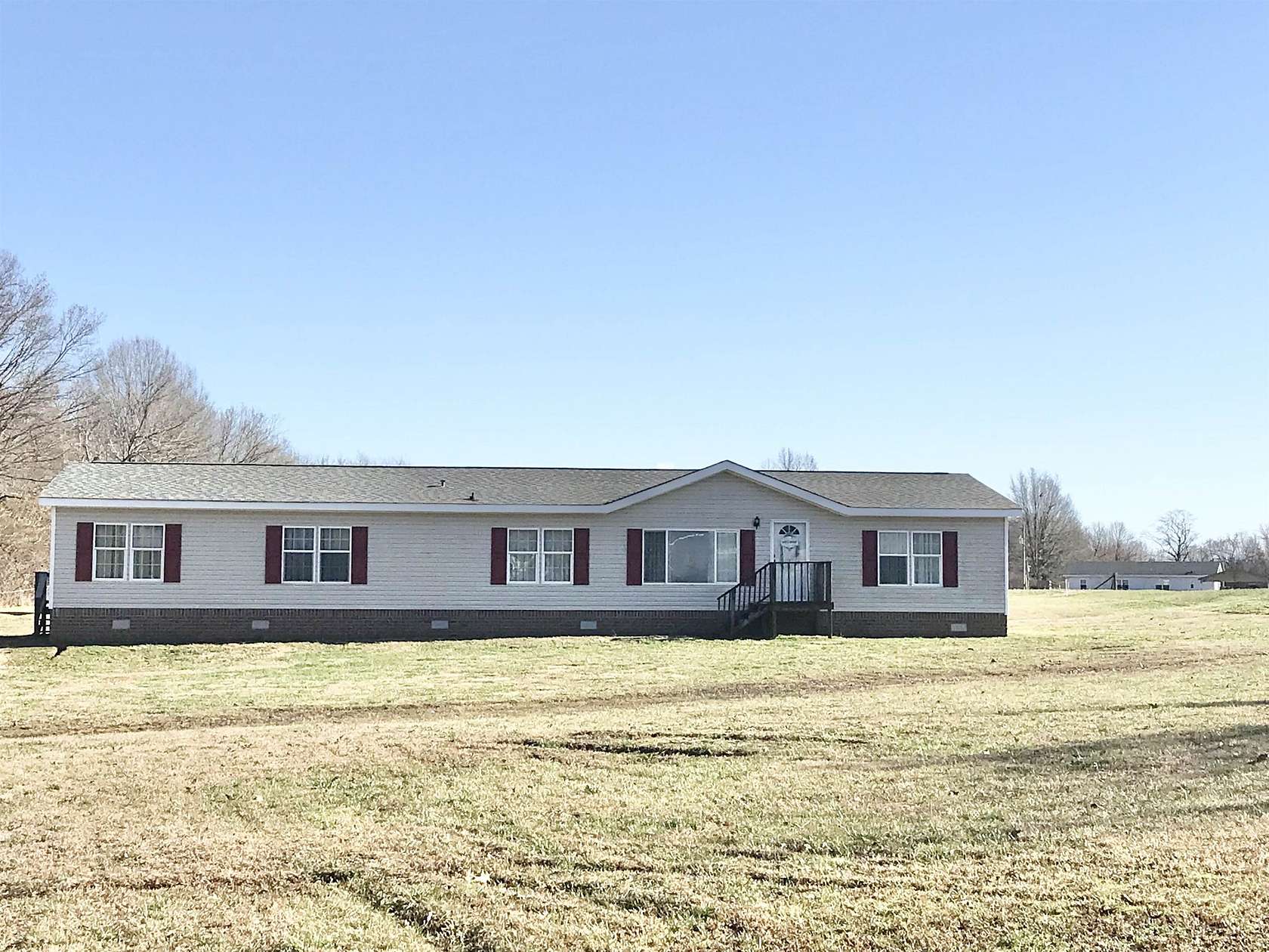 2.1 Acres of Residential Land with Home for Sale in Milan, Tennessee
