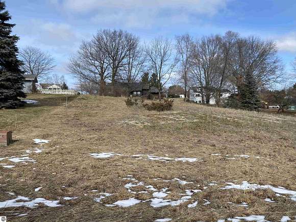 0.58 Acres of Residential Land for Sale in Williamsburg, Michigan