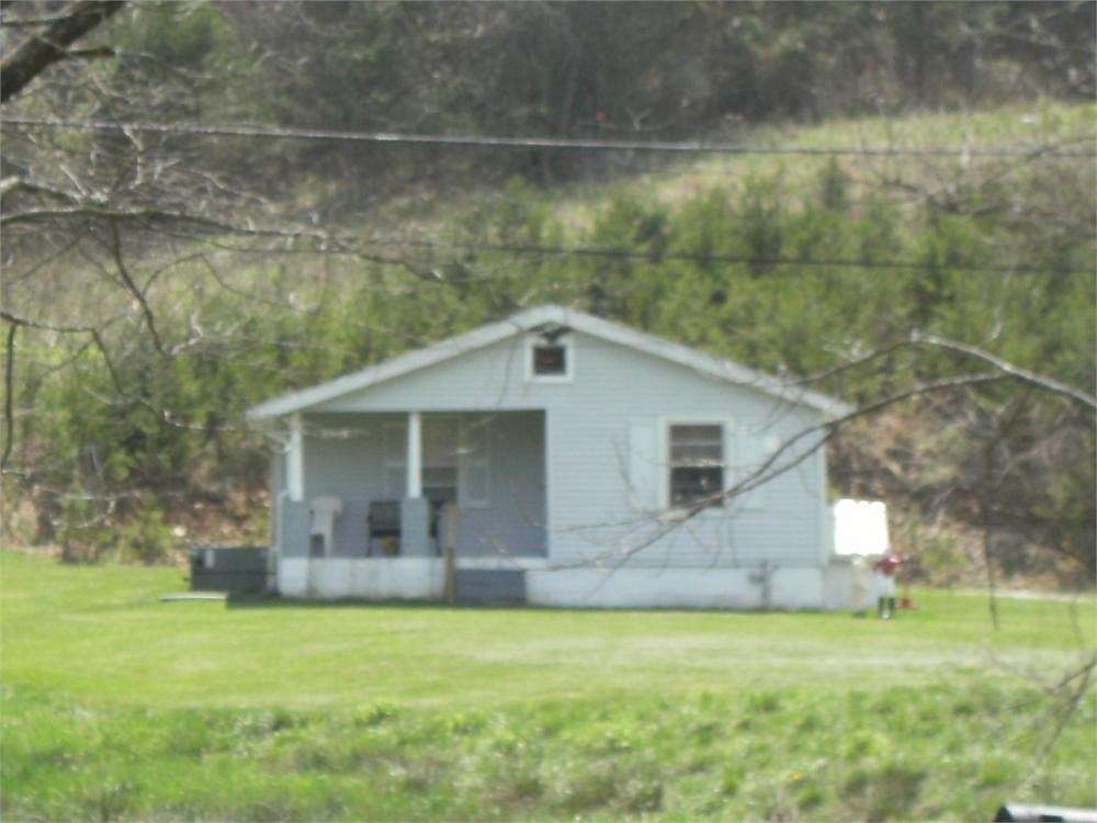 7 Acres of Residential Land with Home for Sale in Woodbine, Kentucky